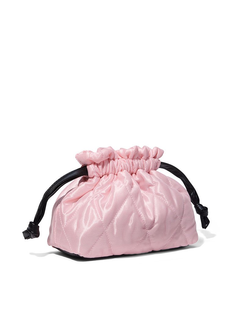 Trousse Matelassée, Description, large