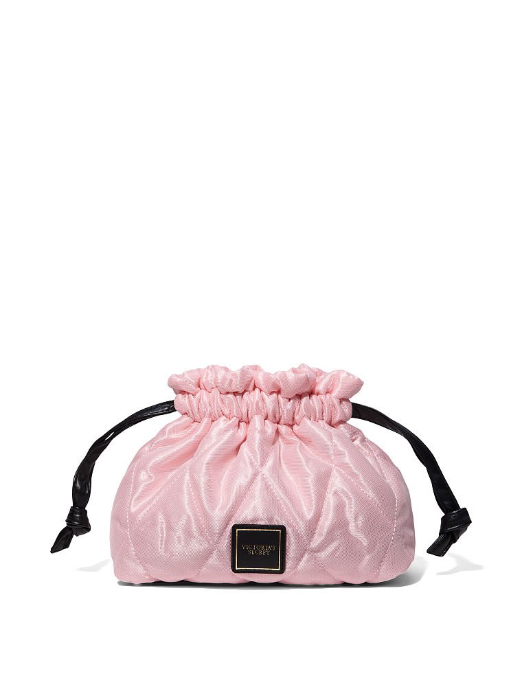 Trousse Matelassée, Description, large